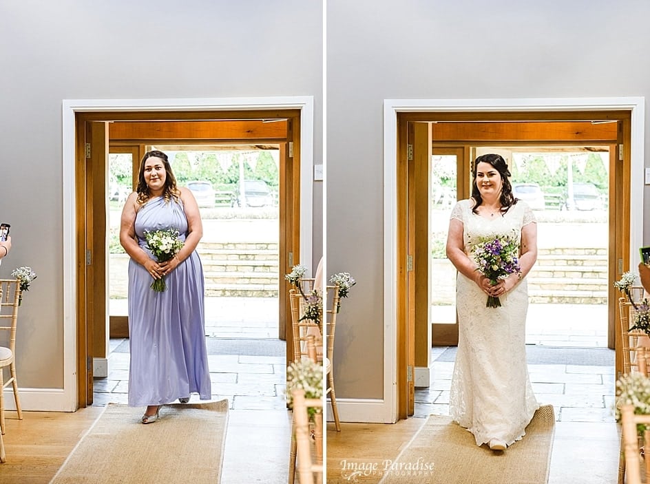Hyde Barn wedding Cotswolds 9 Bride walking down aisle