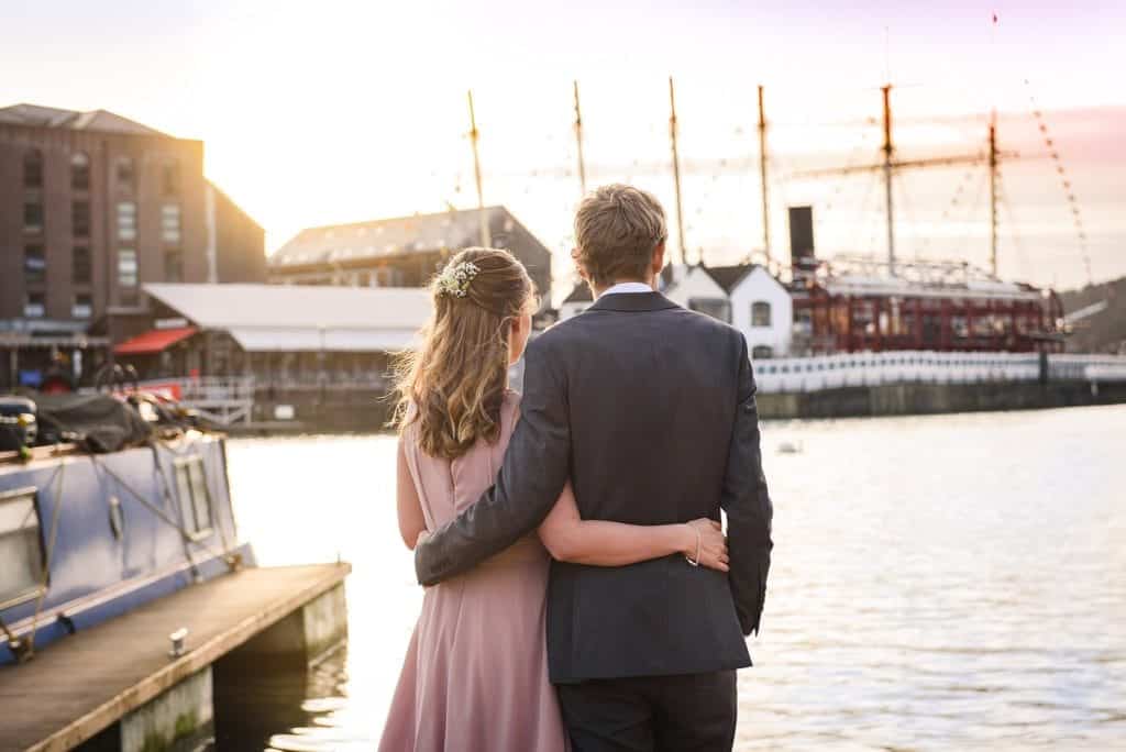 wedding couple watch the sunset over the SS Great Britain