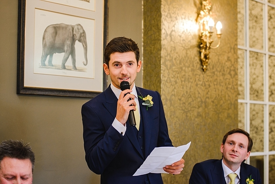 Best man talking into microphone at a Bristol zoo wedding