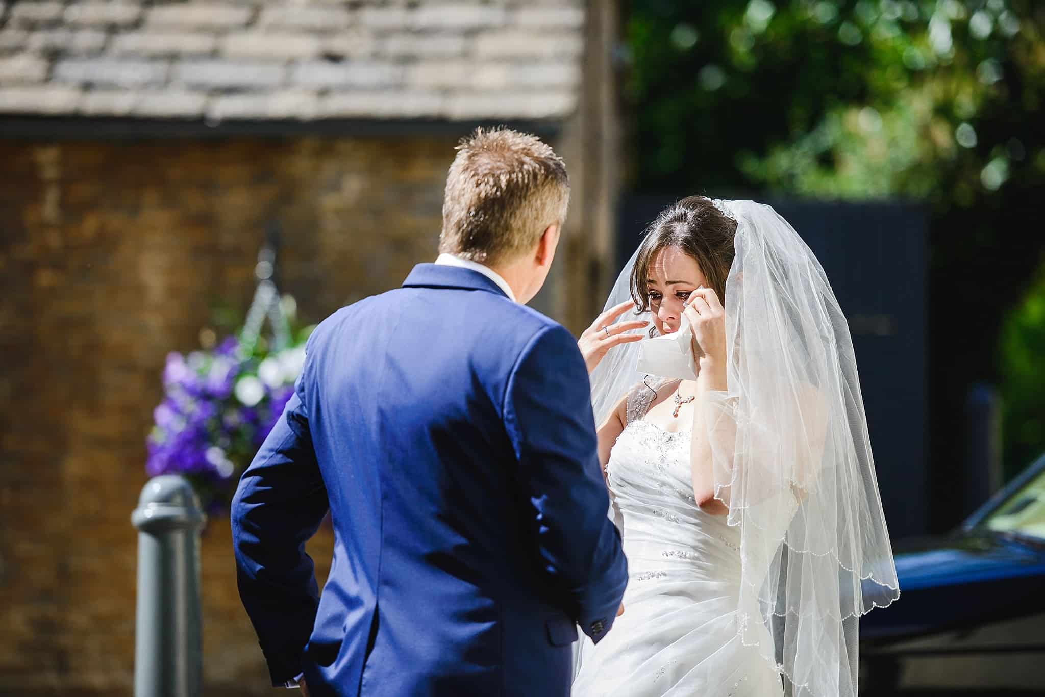 Emotional bride crying just before her wedding at the Hare and Hounds