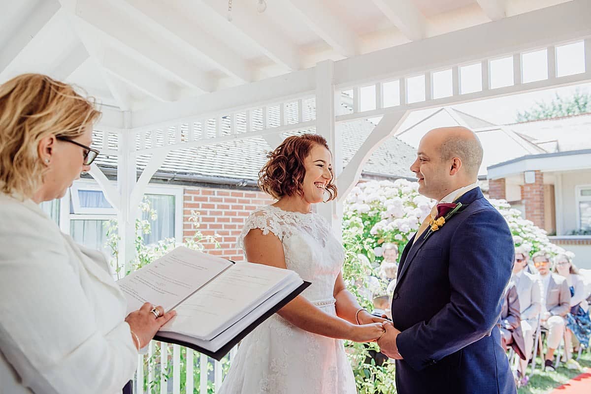 The Beachlands hotel - Weston-Super-Mare Wedding 12 Bride and groom exchange vows at their wedding ceremony WSM