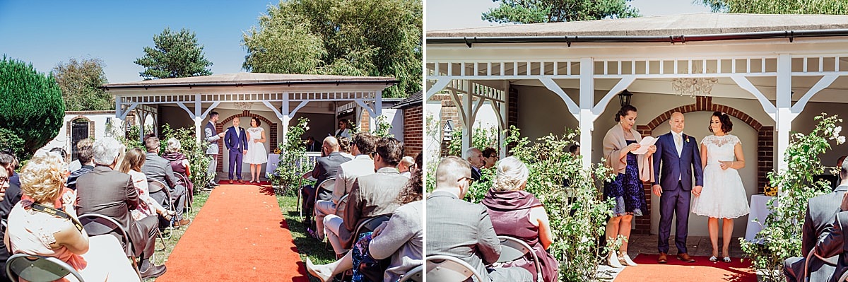 two guests reading at a wedding ceremony