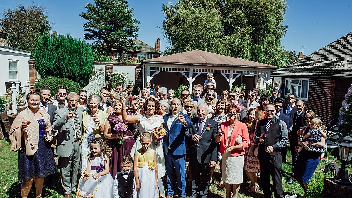 Big group photo of all the guests at a wedding at the Beachlands hotel in Weston Super Mare