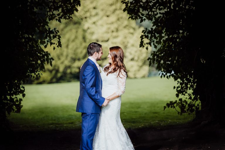 Bride and groom portrait in the gardens of Gregnog Hall