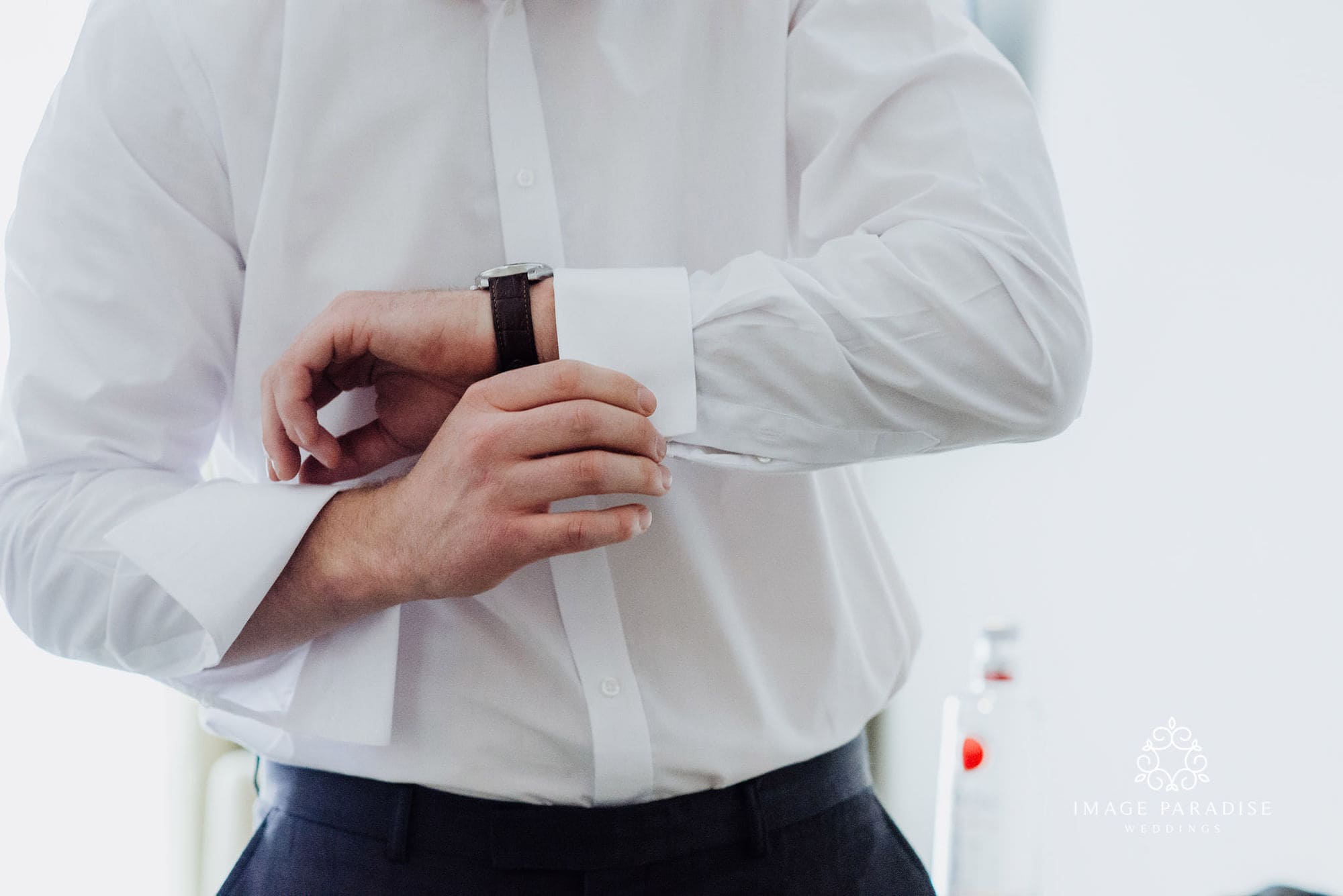 Cotswolds Hotel & Spa wedding photography | Chipping Norton photographer 11 Groom doing up cufflinks