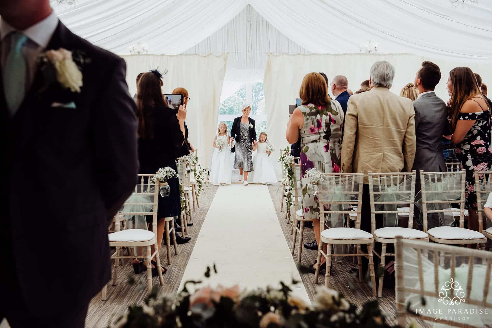 Cotswolds Hotel & Spa wedding photography | Chipping Norton photographer 14 small bridesmaids walking down the aisle of the Cotswolds hotel and spa wedding ceremony