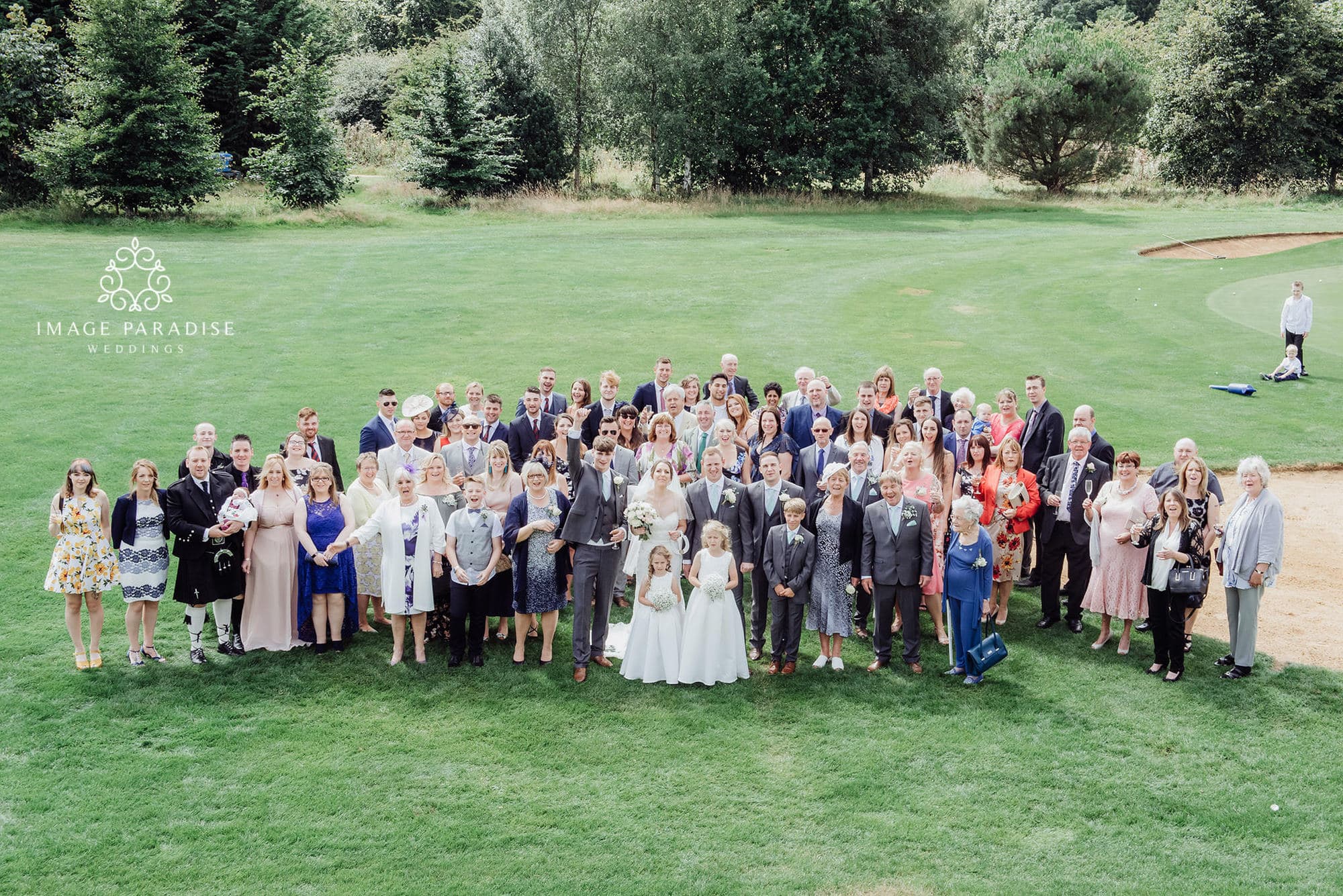 Cotswolds Hotel & Spa wedding photography | Chipping Norton photographer 21 Group wedding photo on the green of Cotswolds hotel and spa