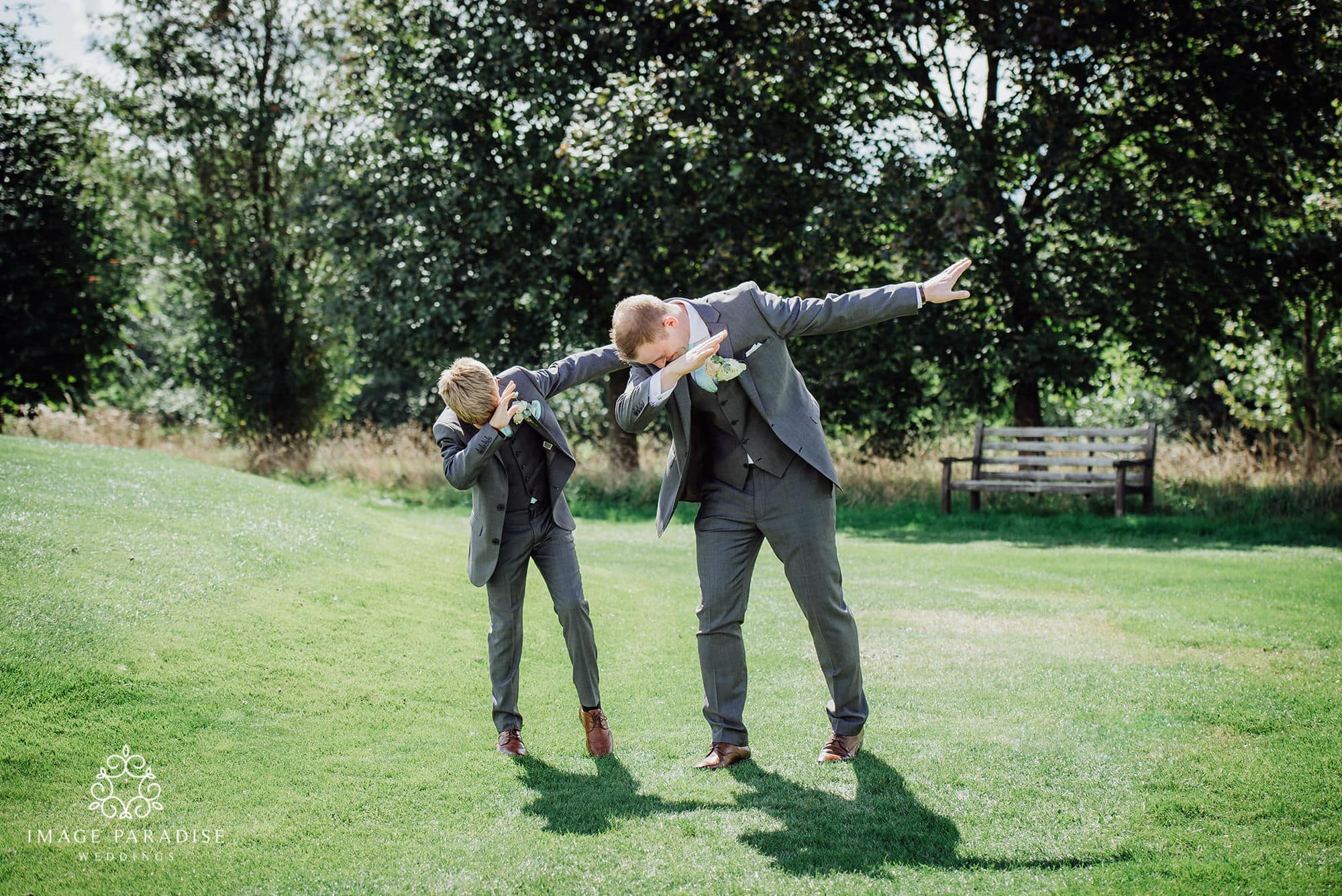 Cotswolds Hotel & Spa wedding photography | Chipping Norton photographer 24 groom and son doing dabbing pose at the Cotswolds hotel and spa