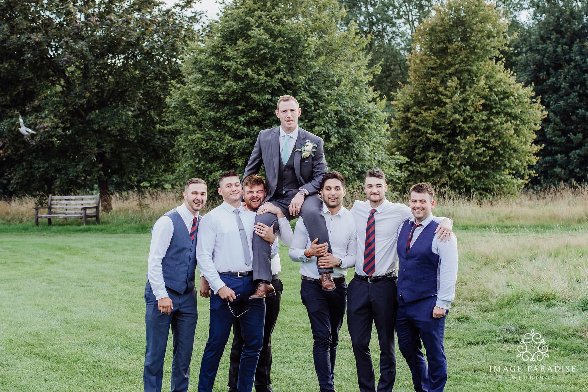 Cotswolds Hotel & Spa wedding photography | Chipping Norton photographer 25 groom sits on friends shoulders