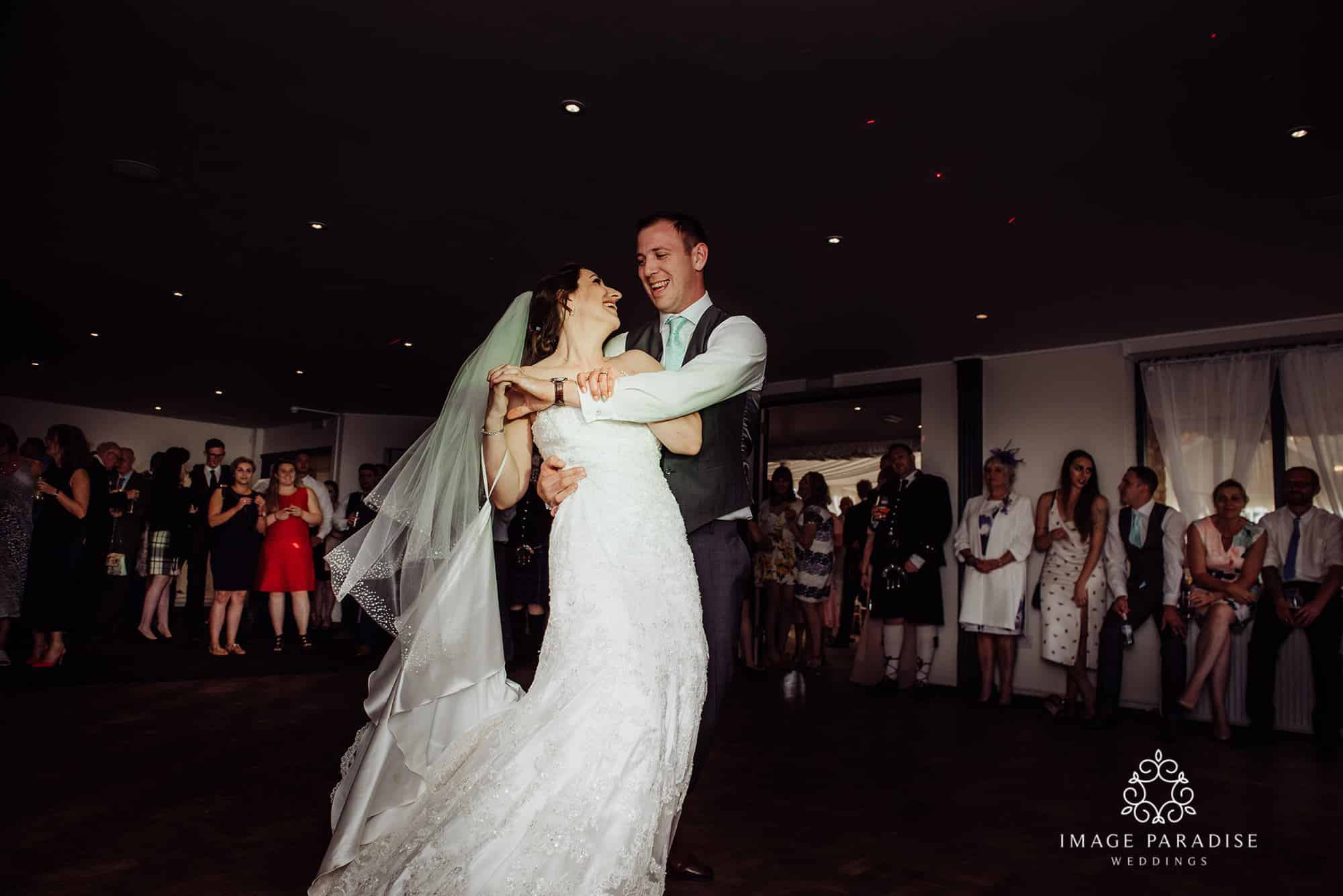Cotswolds Hotel & Spa wedding photography | Chipping Norton photographer 41 the first dance where groom spins his bride on the dance floor at the Cotswolds hotel and spa