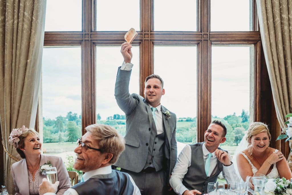 best man saying toast at Orchardliegh house dining room