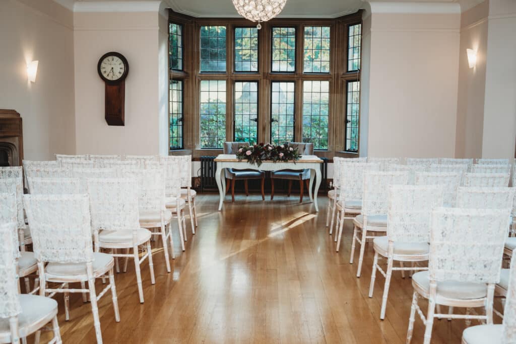 chairs set up for a indoor wedding ceremony at Coombe Lodge Bristol